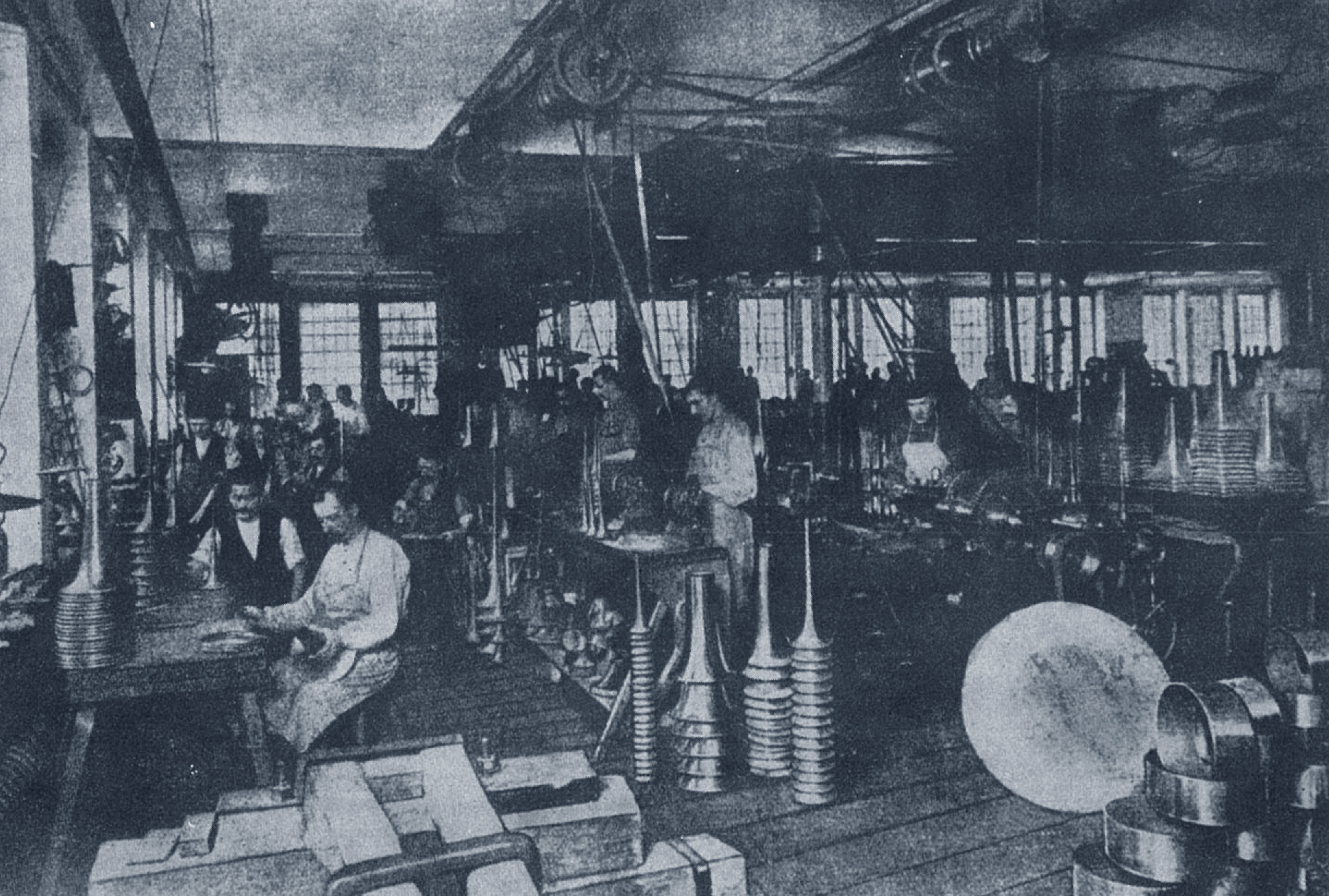 In the bell-section workshop of a Graslitz brass instrument factory.