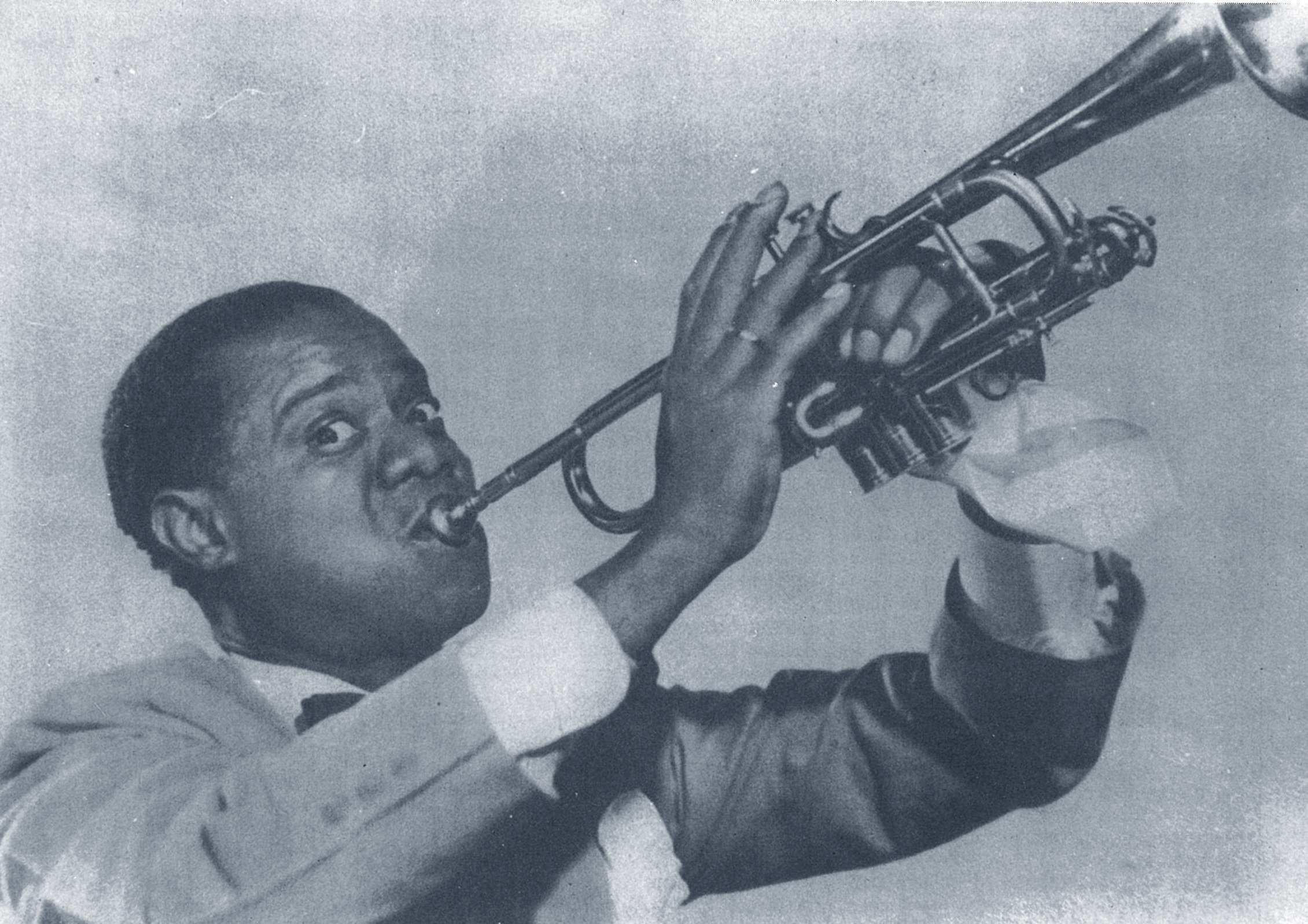 Louis Armostrong on trumpet (Coll. Michel Laplace)