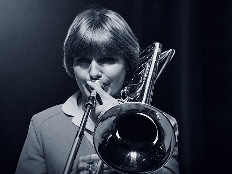 A woman trombonist, Yvelise Girard
