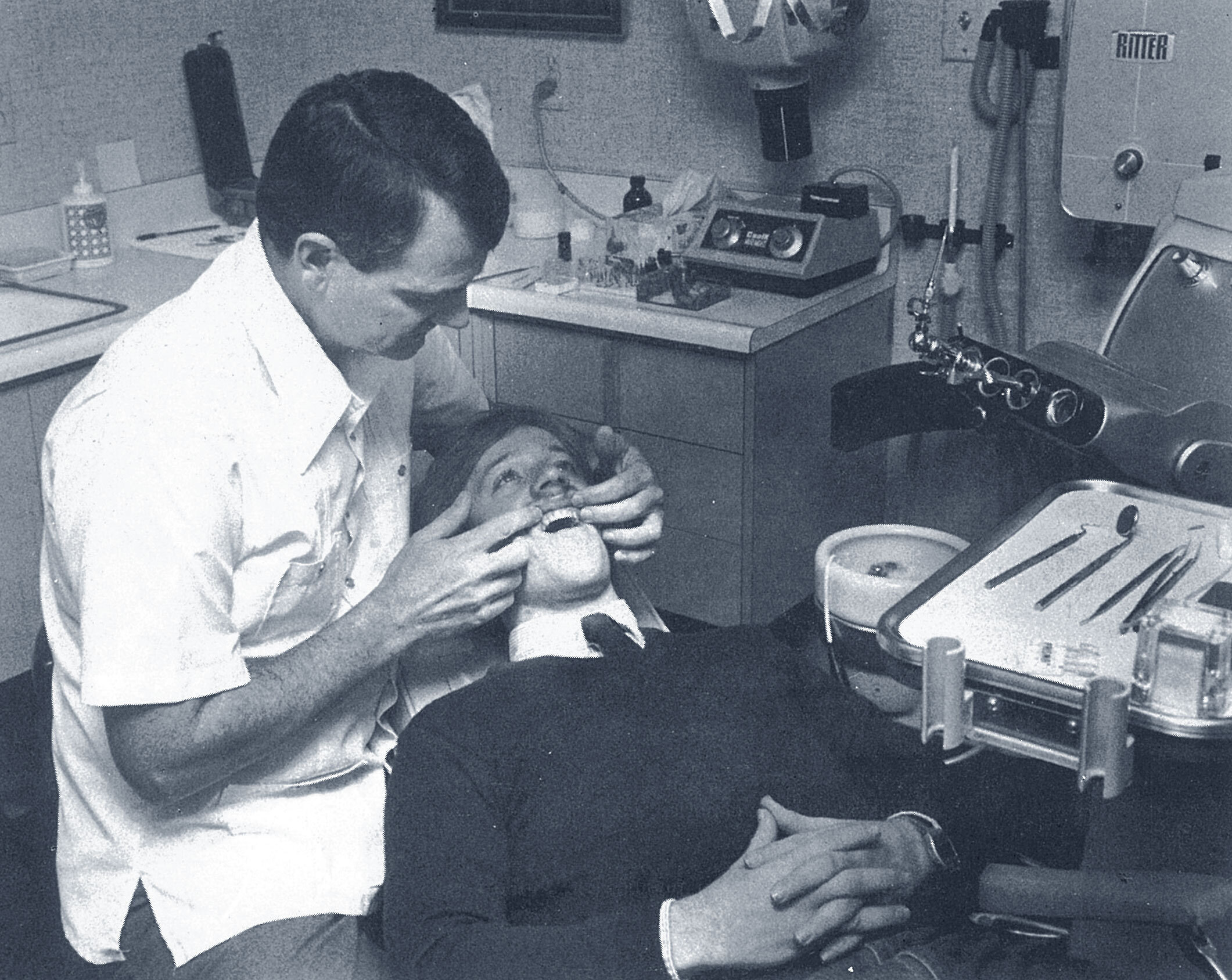 Dr. Van Osdol examining patient for bonding