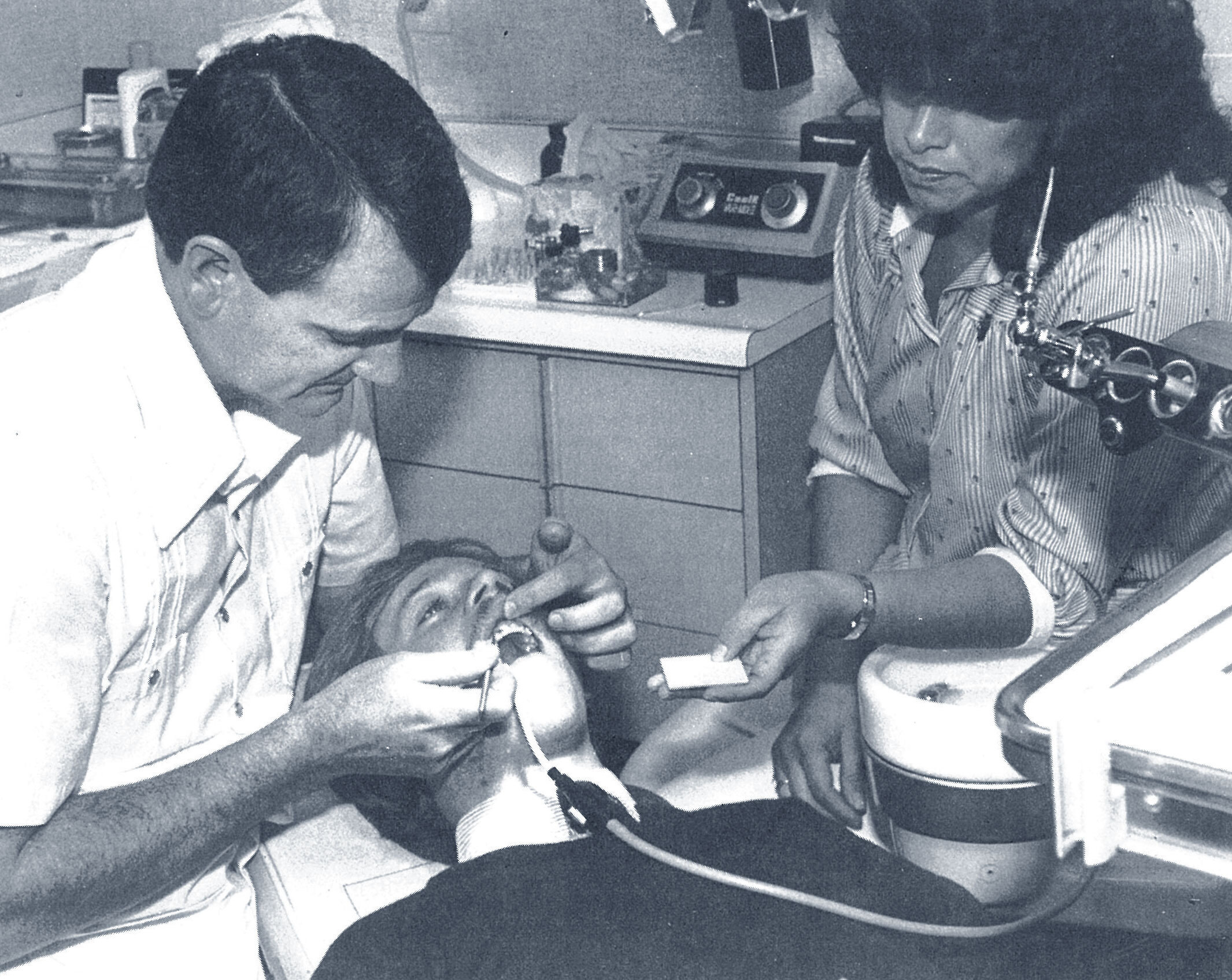 Applying the putty-like plastic compound prior to curing with light system